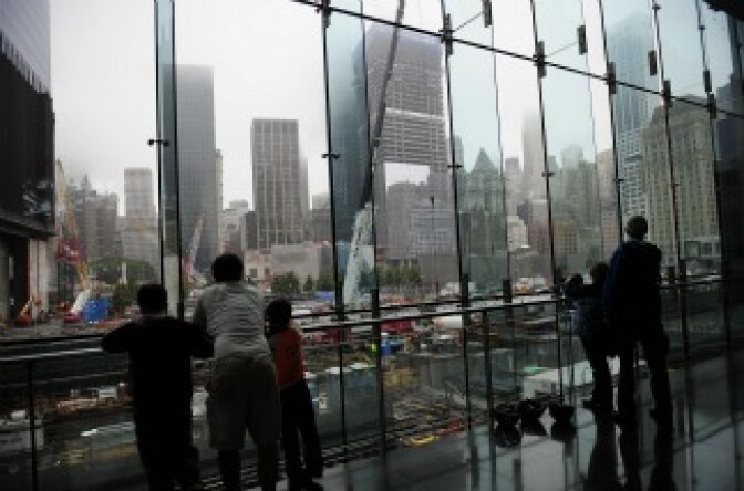 People look at construction in progress at Ground Zero on September 7, 2011. 