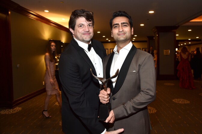 LOS ANGELES, CA - FEBRUARY 13:  Writer Clay Tarver (L), winner of the Episodic Comedy award for 'Silicon Valley' and actor/comedian Kumail Nanjiani pose during the 2016 Writers Guild Awards at the Hyatt Regency Century Plaza on February 13, 2016 in Los Angeles, California.  (Photo by Alberto E. Rodriguez/Getty Images for Writers Guild of America, West)