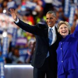PHILADELPHIA, PA - JULY 27:  US President Barack Obama and Democratic Presidential nominee Hillary Clinton wave to the crowd on the third day of the Democratic National Convention at the Wells Fargo Center, July 27, 2016 in Philadelphia, Pennsylvania. Democratic presidential candidate Hillary Clinton received the number of votes needed to secure the party's nomination. An estimated 50,000 people are expected in Philadelphia, including hundreds of protesters and members of the media. The four-day Democratic National Convention kicked off July 25.  (Photo by Aaron P. Bernstein/Getty Images)