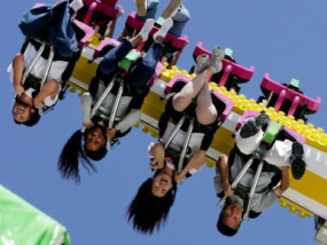 Fair-goers enjoy a ride at the San Diego County Fair June 29, 2005 in Del Mar, California. The fair features games, rides, live entertainment, livestock shows, food and much more and is one of the 10 largest fairs in North America.