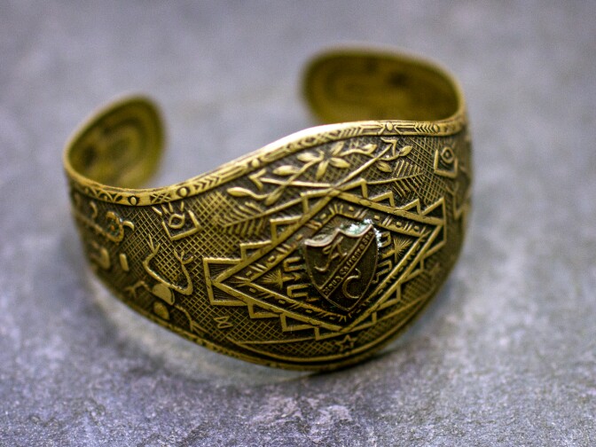 A bracelet features the Agua Caliente crest. It's estimated to be from between 1928 and 1935.