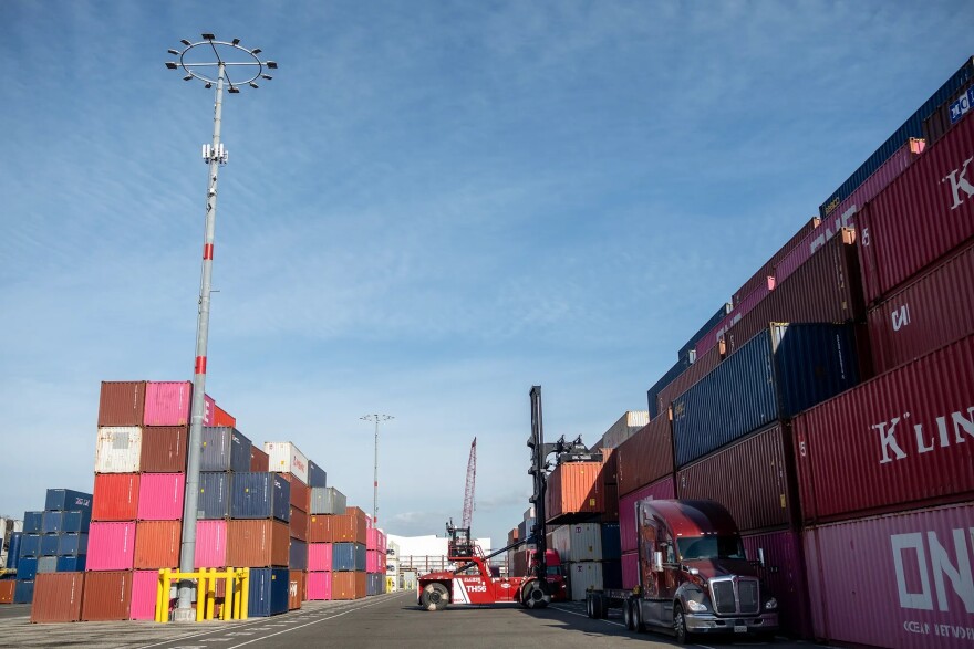 A container ship sits docked at the Port of Los Angeles.