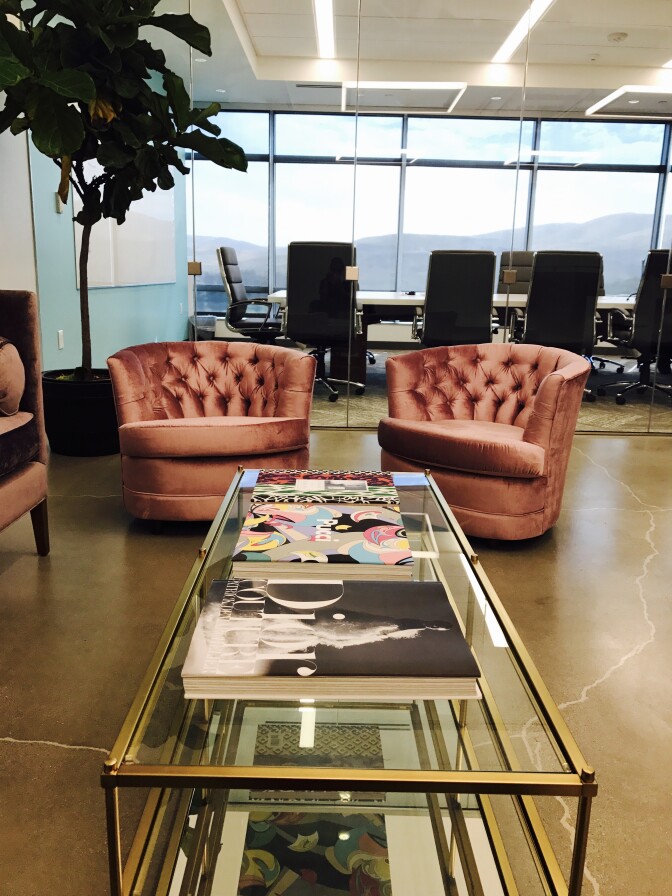 At LuLaRoe headquarters in Corona, velvet sofas and chairs dot a concrete floor, and the wall-to-wall windows look out on acres of mostly vacant land. CEO DeAnne Stidham wanted to keep her office in the Inland Empire where she's lived for decades.