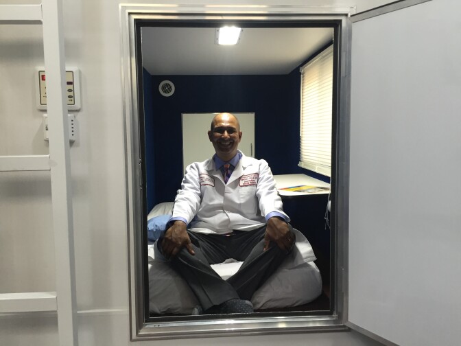 Dr. Raj tests out a Nappify pod