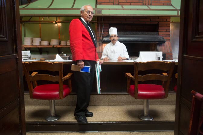 Alonzo Castillo, known as Panama, has served at Musso & Frank Grill in Hollywood for over 40 years and Domingo Pule has been making Musso's signature flannel cakes for the past 23 years. Panama says his favorite customer was John Wayne.