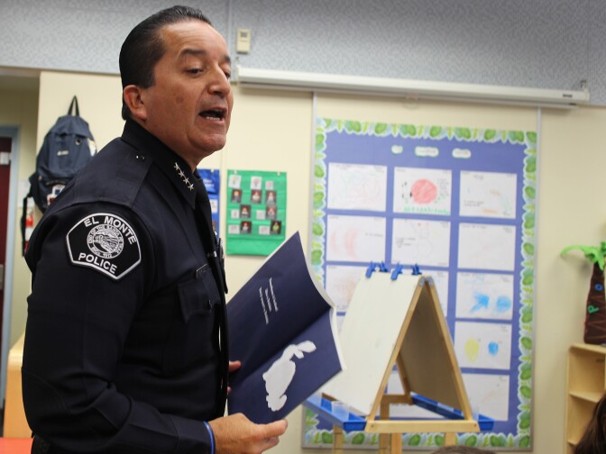 El Monte Police Chief David Reynoso reading to preschoolers at the Jeff Seymour Family Center in El Monte September 25, 2017.