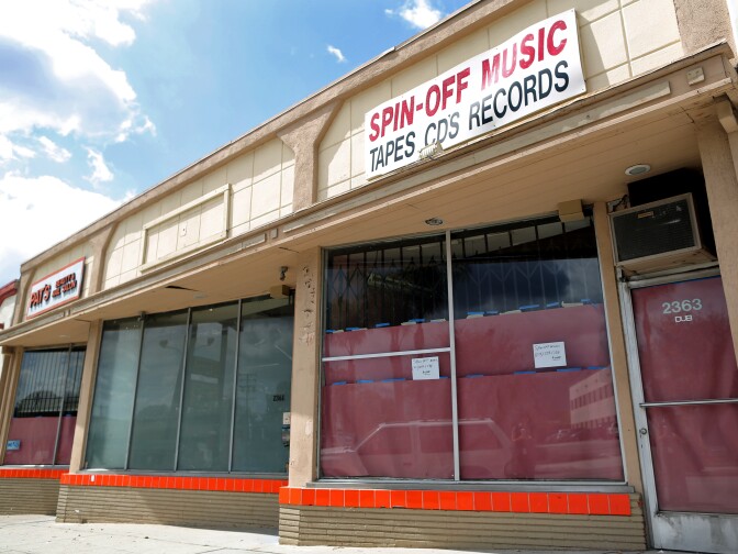 At least three businesses are gone on Lincoln Avenue. A CD store and hair salon left after a Pasadena publisher bought the building. L.A. County will soon spend more than $200,000 to apply new paint, glass and light fixtures to this building and others.