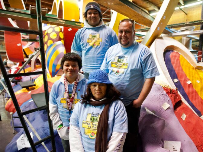 Ernesto Bravo Chavez, 12, his brother, Arturo, and mother, Rosario, with Gabriel Barajas' brother, Rodolfo, at the Rosemont Pavilion on Friday.