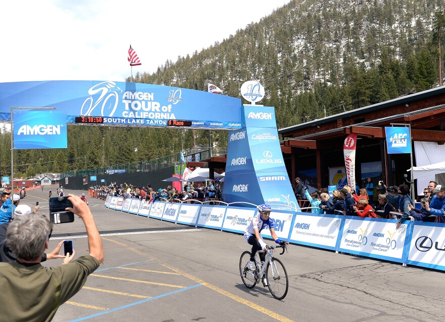 SOUTH LAKE TAHOE, CA - MAY 08: Katie Hall riding for UnitedHealthcare Pro Cycling crosses the finish line to win stage one of the 2015 Amgen Tour of California women's race at the Heavenly Mountain Resort on May 8, 2015 in South Lake Tahoe, California. (Photo by Harry How/Getty Images)