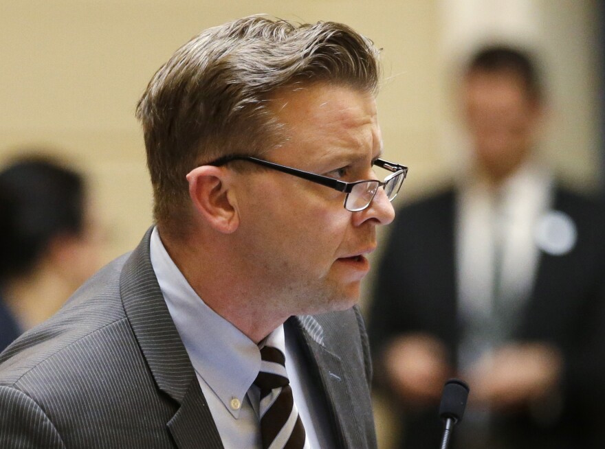 FILE - In this March 2, 2015 file photo, Republican Sen. Todd Weiler speaks on the senate floor at the Utah state Capitol in Salt Lake City. Weiler, wants to declare pornography a public health crisis, echoing an argument being made around the U.S. by conservative religious groups as porn becomes more accessible on smartphones and tablets. Utah lawmakers are scheduled to discuss the resolution Friday, Feb. 5, 2016 in a legislative hearing. (AP Photo/Rick Bowmer, File)