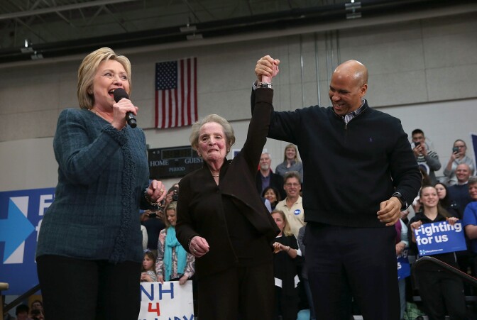 CONCORD, NH - FEBRUARY 06:  (L-R) Democratic presidential candidate former Secretary of State Hillary Clinton, former Secretary of State Madeleine Albright and U.S. Sen. Cory Booker (D-NJ) participate in a get out the vote organizing event at Rundlett Middle School on February 6, 2016 in Concord, New Hampshire. With less than one week to go before the New Hampshire primaries, Hillary Clinton continues to campaign throughout the state.  (Photo by Justin Sullivan/Getty Images)