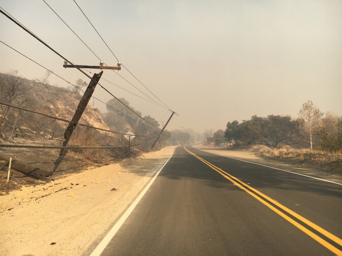 Some of the many utility poles and power lines that burned in the Thomas Fire. These poles were awaiting repairs on Dec. 6, 2017 on Highway 150 north of Santa Paula.