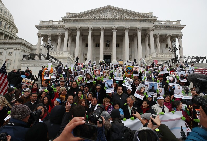 People who call themselves DREAMers protest in front of the U.S. Capitol on December 6, 2017. They want Congress to passing a legislative fix for the Deferred Action for Childhood Arrivals (DACA) program.