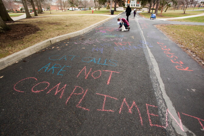 Selinsgrove, PA (April 4, 2014) -- The Susquehanna University Women's Studies Program held its second annual Chalk the Walk event for International Anti-Street Harassment Week. Students and faculty wrote anti-street harassment messages in chalk on the main walkway through campus.