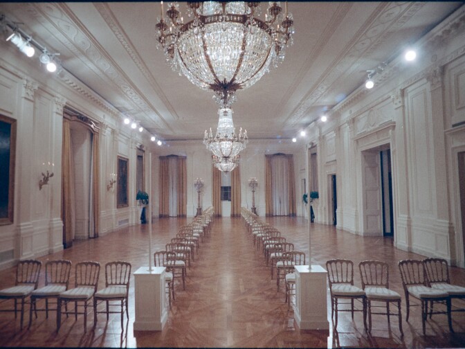 This photograph shows preparations for the Nixon wedding reception in the East Room.