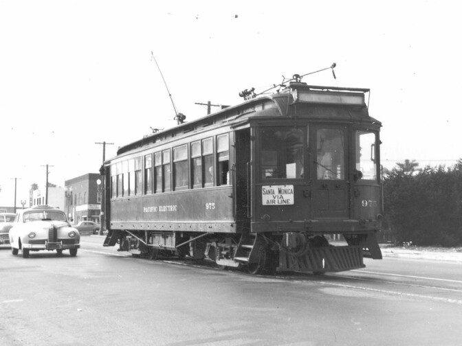 A Red Car on the Santa Monica Air Line makes its way down the street circa 1940.
