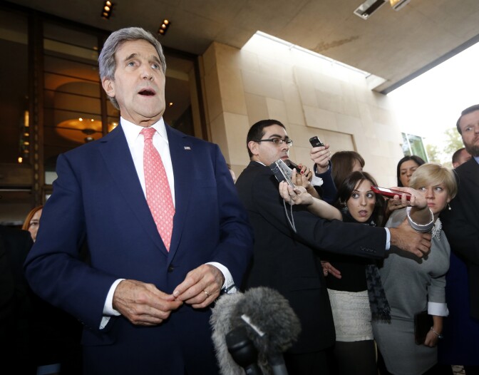 US Secretary of State John Kerry speaks to the press upon his arrival in Geneva on November 8, 2013, on the second day of talks with Iran on their nuclear programme. World powers and Iran have yet to reach a deal on Iran's nuclear programme but are working hard to do so, US Secretary of State John Kerry said on November 8. "There is not an agreement at this point," Kerry said shortly after arriving in Geneva to help seal what is hoped to be a landmark with Tehran, but stressed that the six world powers leading the talks were "working hard."  AFP PHOTO / POOL / JASON REEED