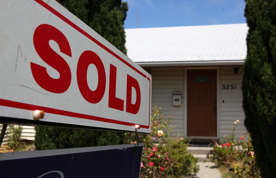 RICHMOND, CA - JULY 23:  A "Sold" sign is seen in front of a home that was for sale July 23, 2009 in Richmond, California. The National Association of Realtors reported today that sales of existing homes were up for the third consecutive month, rising 3.6 percent in June. (Photo by Justin Sullivan/Getty Images)