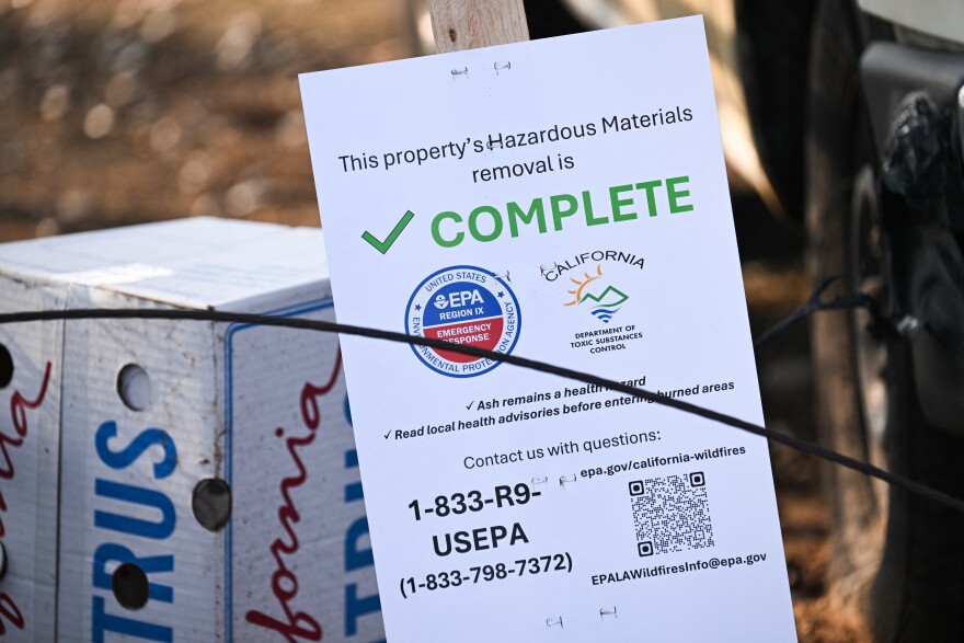 A piece of paper saying "This property's Hazardous Materials removal is complete."