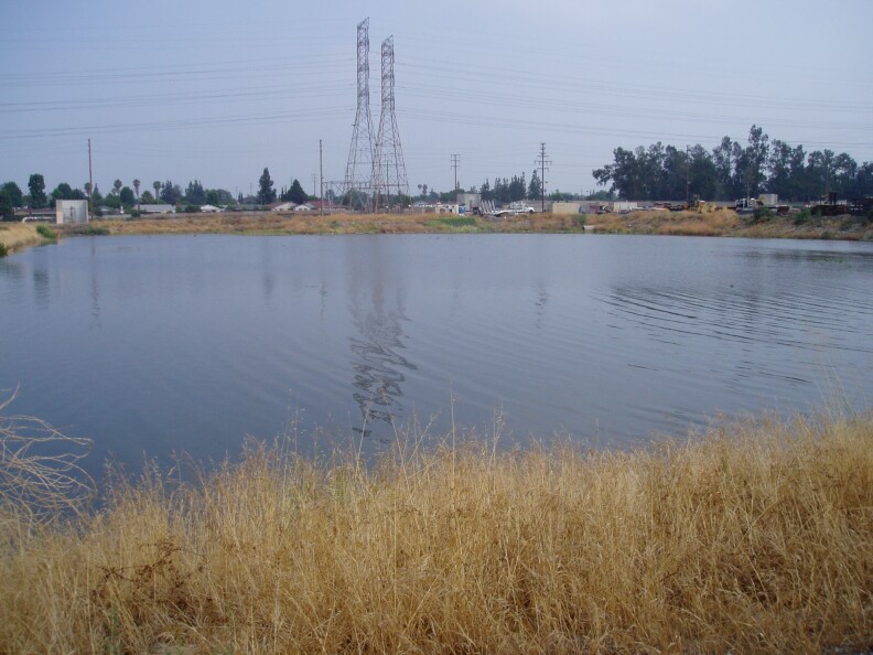 Stormwater diverted to the Tujunga Spreading Grounds percolates down through layers of soil, which filter it. 