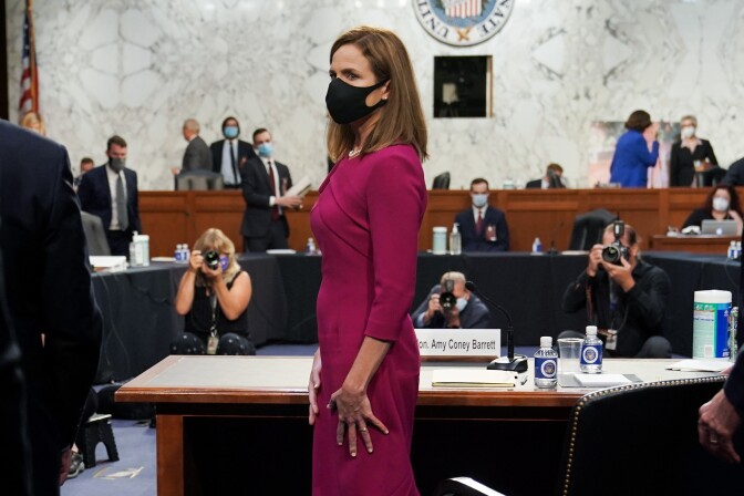 WASHINGTON, DC - OCTOBER 12: Supreme Court Justice nominee Judge Amy Coney Barrett leaves for a lunch break during her Senate Judiciary Committee confirmation hearing for Supreme Court Justice on Capitol Hill on October 12, 2020 in Washington, DC. With less than a month until the presidential election, President Donald Trump tapped Amy Coney Barrett to be his third Supreme Court nominee in just four years. If confirmed, Barrett would replace the late Associate Justice Ruth Bader Ginsburg. (Photo by Greg Nash - Pool/Getty Images)
