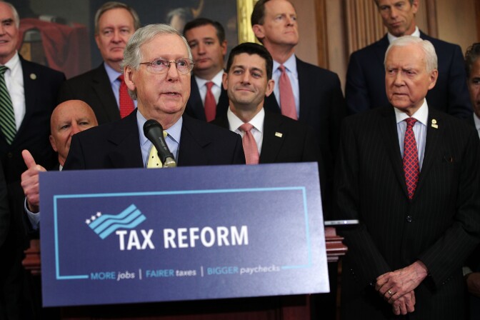 WASHINGTON, DC - SEPTEMBER 27:  U.S. Senate Majority Leader Sen. Mitch McConnell (R-KY) speaks as Speaker of the House Rep. Paul Ryan (R-WI), Sen. Orrin Hatch (R-UT) and other congressional Republicans listen during a press event on tax reform September 27, 2017 at the Capitol in Washington, DC. On Wednesday, Republican leaders proposed cutting tax rates for the middle class, wealthy and businesses. Key questions remain on how they plan to offset the trillions of dollars in lost tax revenue.  (Photo by Alex Wong/Getty Images)
