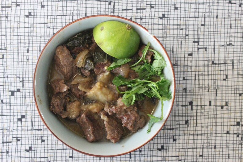 The finished product - curried beef with eggplant, topped with cilantro and lime 