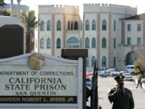 A guard stands at the entrance to the California State Prison at San Quentin in San Quentin, California. 