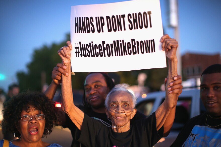 ST. LOUIS, MO - AUGUST 12, 2014:  Eighty-eight-year-old Creola McCalister joins other demonstrators protesting the killing of teenager Michael Brown.