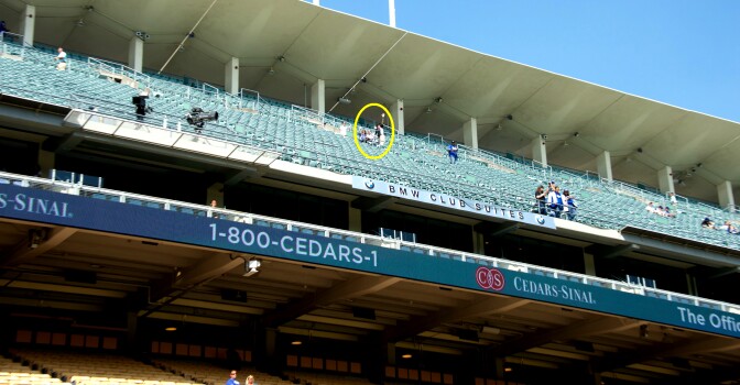 KPCC's John Rabe with Shanna (Santa Clarita) and her dad Mark (Lancaster), longtime Dodger fans who have seats in the nosebleed section.