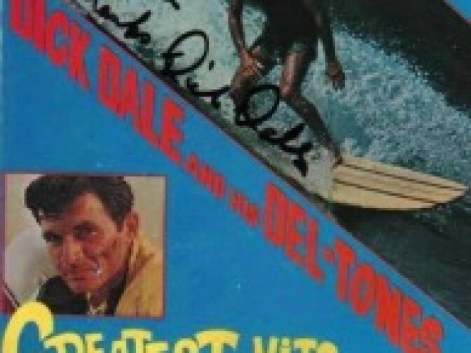 An autographed Dick Dale LP.
