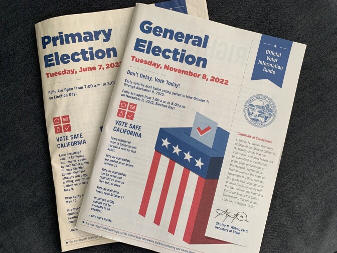 Two California voter information guides from the June 2022 primary and November 2022 general election.