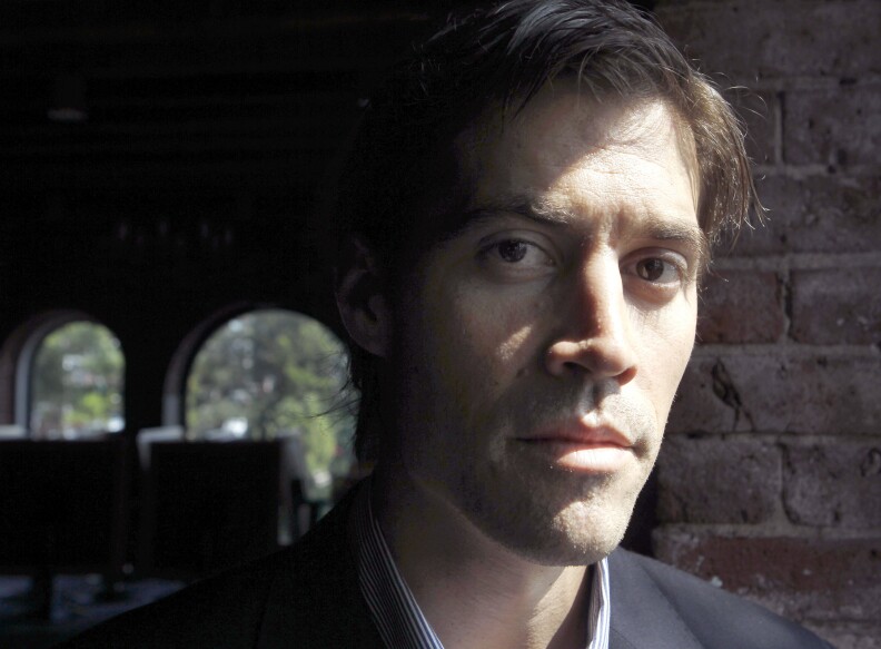 FILE - In this May 27, 2011 file photo, American journalist James Foley, of Rochester, N.H., who was last seen on Nov. 22, 2012 in northwest Syria, poses for a photo in Boston.