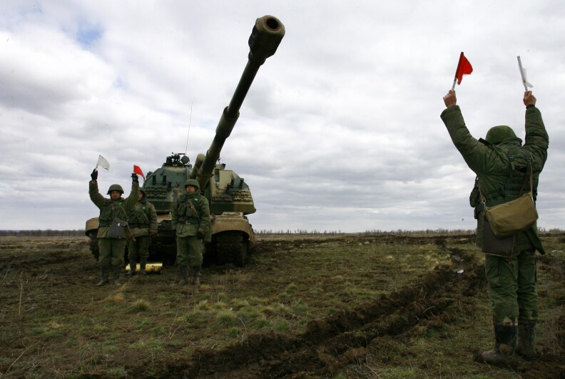 Russian soldiers prepare to fire their Msta-S self-propelled howitzer during military exercises in the southern Russia's Volgograd region, on April 2, 2014. Russian troops deployed close to the Ukrainian border will return to base after completing their exercises, Foreign Minister Sergei Lavrov said today. NATO said yesterday it had stepped back from a floated idea to reinforce the alliance's military presence in countries bordering Russia, preferring for now to suspend cooperation with Moscow and give more time to talks. 