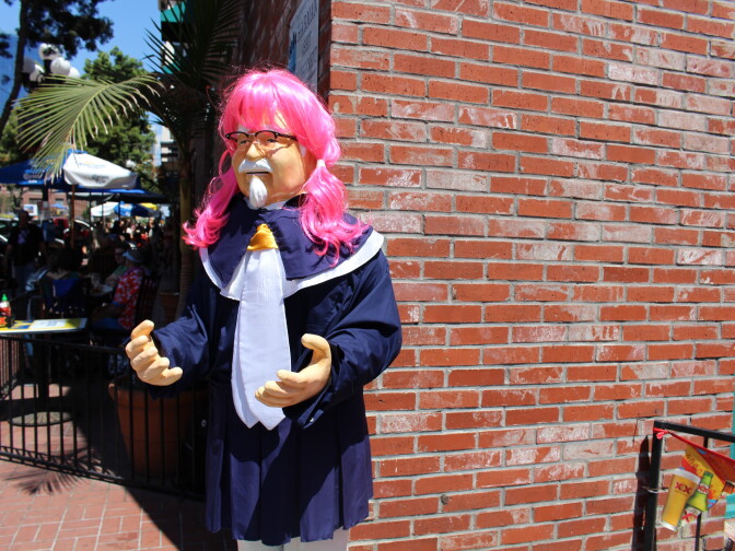 A KFC Colonel Sanders statue — that also offered free wifi — dressed in anime cosplay during San Diego Comic-Con 2015.