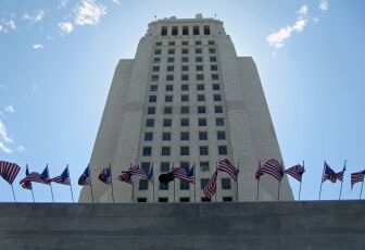 The L.A. city budget includes increases in parking fines and the elimination of funds that allow Angelenos to remotely testify before the L.A. City Council. 