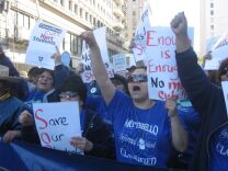 Protestors gather in downtown Los Angeles to rally against cuts to public schools and universities.