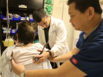PANORAMA CITY, CA - JANUARY 28:  Dr. Jason Greenspan (L) and emergency room nurse Junizar Manansala care for a patient in the ER of Mission Community Hospital where doctors held a press conference outside on a class action lawsuit against the state of California by a coalition of emergency room physicians claiming that without additional funding, the entire emergency healthcare system is on the verge of collapse on January 28, 2009 in Panorama City, California. According to the coalition, the cost of providing emergency room treatment has nearly doubled over the past decade and patient load increased by more than 28 percent while Medi-Cal reimbursements have remained largely unchanged. During that time, 85 California hospitals in California have closed and an additional 55 facilities have shut down their emergency rooms.  California now reportedly ranks worst in the nation for access emergency care and last in emergency rooms per capita. California has seven emergency rooms per million people while the national average is 20 emergency rooms per million people.  (Photo by David McNew/Getty Images) *** Local Caption *** Junizar Manansala;Jason Greenspan