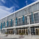 An entrance to the Long Beach Convention Center is seen on April 7, 2021 in Long Beach, California. - The Long Beach mayor tweeted that the city council approved a proposal to temporally lease the center to the US Department of Health and Human Services (HHS) as part of a plan to shelter unaccompanied migrant children. The convention center parking lot is also part of a Covid-19 vaccination site. (Photo by Patrick T. FALLON / AFP) (Photo by PATRICK T. FALLON/AFP via Getty Images)