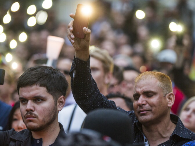 Thousands attend a vigil on Monday, June 13, 2016 at Los Angeles City Hall memorializing those who died in Sunday's attack in Orlando.
