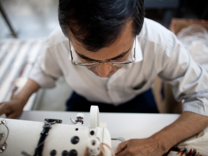 Alberto Servia puts the finishing touches on clothing at the Karen Kane warehouse. 90% of the entire production process is based in Los Angeles; 10% is shipped overseas.