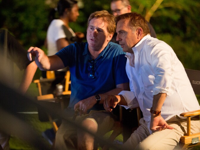 Director Mike Binder discusses a scene with star Kevin Costner on the set of Relativity Media's "Black or White."
 