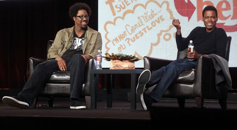 PASADENA, CA - JANUARY 09: Host W. Kamau Bell (L) and executive producer Chris Rock of the television show "Totally Biased with W. Kamau Bell" speak during the FX Networks portion of the 2013 Winter Television Critics Association Press Tour at the Langham Hotel and Spa on January 9, 2013 in Pasadena, California.  (Photo by Frederick M. Brown/Getty Images)