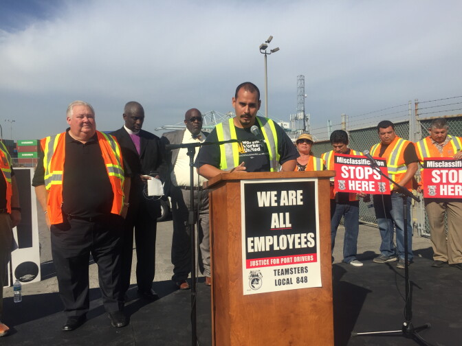 Anthony Vallecillo says he has worked in the warehouse at California Cartage for nearly three years, and is still a temp. 