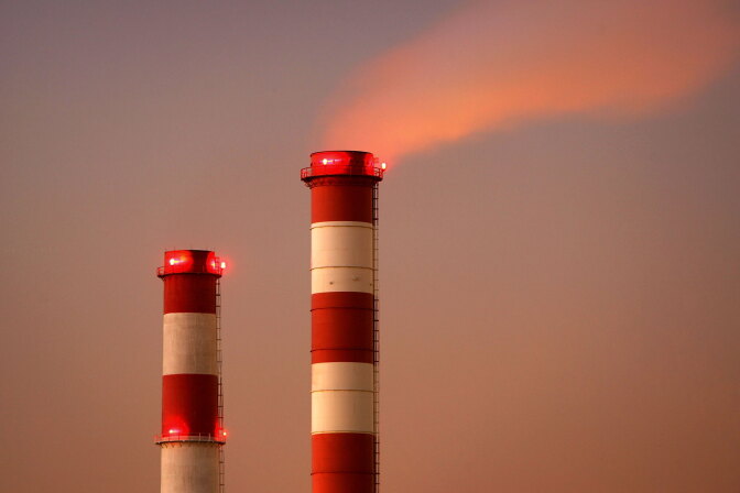 EL SEGUNDO, CA - NOVEMBER 29:  The Scattergood Power Plant operates after sunset on November 29, 2006 in El Segundo, California. The Supreme Court is hearing testimony today in the case known as Massachusetts v. EPA in which environmental groups and a dozen states contend that the federal government should regulate emissions of greenhouse gases that spur global warming. Plaintiffs argue that the United States Environmental Protection Agency (EPA) has the authority to regulate these gases and should put limits on car, truck and power plant emissions that have been shown to hasten climate change. Opponents argue that greenhouse gases do not fit within the federal Clean Air Act?s definition of a pollutant. The Bush administration agrees and has consistently rejected capping greenhouse gas emissions as bad for business and U.S. workers.  (Photo by David McNew/Getty Images)