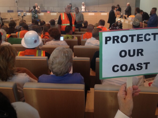 Hundreds turn out for a California Coastal Commission meeting on the fate of plans to put a desalination plant in Huntington Beach. 