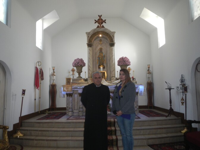 Father David Bedrossian with Karoun Baroussalian, a member of the congregation at Our Lady Queen of Martyrs Armenian Catholic Church in Los Angeles. 