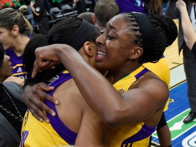 MINNEAPOLIS, MN - OCTOBER 11: Candace Parker #3 and Nneka Ogwumike #30 of the Los Angeles Sparks hug after a win in Game Five of the 2016 WNBA Finals against the Minnesota Lynx on October 11, 2016 at Target Center in Minneapolis, Minnesota. The Sparks defeated the Lynx 77-76 to win the WNBA Championship. NOTE TO USER: User expressly acknowledges and agrees that, by downloading and or using this Photograph, user is consenting to the terms and conditions of the Getty Images License Agreement. (Photo by Hannah Foslien/Getty Images)