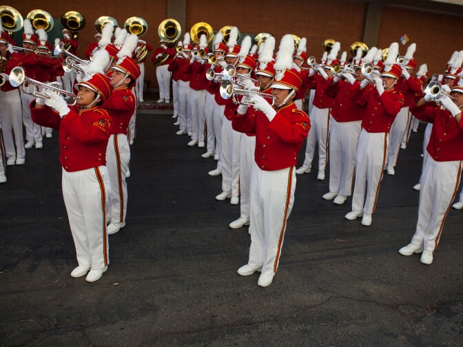 The trumpet section of the Tournament of Roses Honor Band practices before their performance at the 2011 Tournament of Roses Parade.