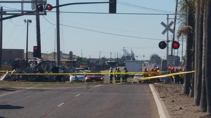 Three cars of a Southern California Metrolink commuter train derailed and tumbled onto their sides after a collision with a truck on tracks in Ventura County northwest of Los Angeles.